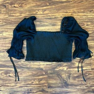 Urban Outfitters crop top with sheer sleeves.  Size L.